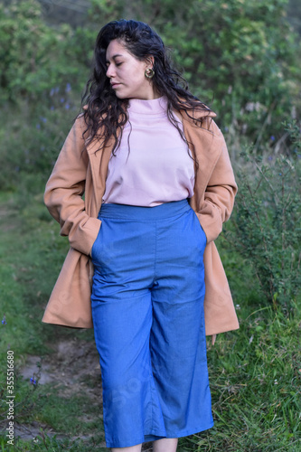 Model Woman poses in nature
