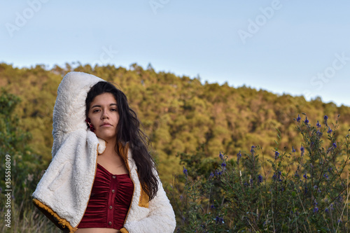 Model Woman poses in the mountain