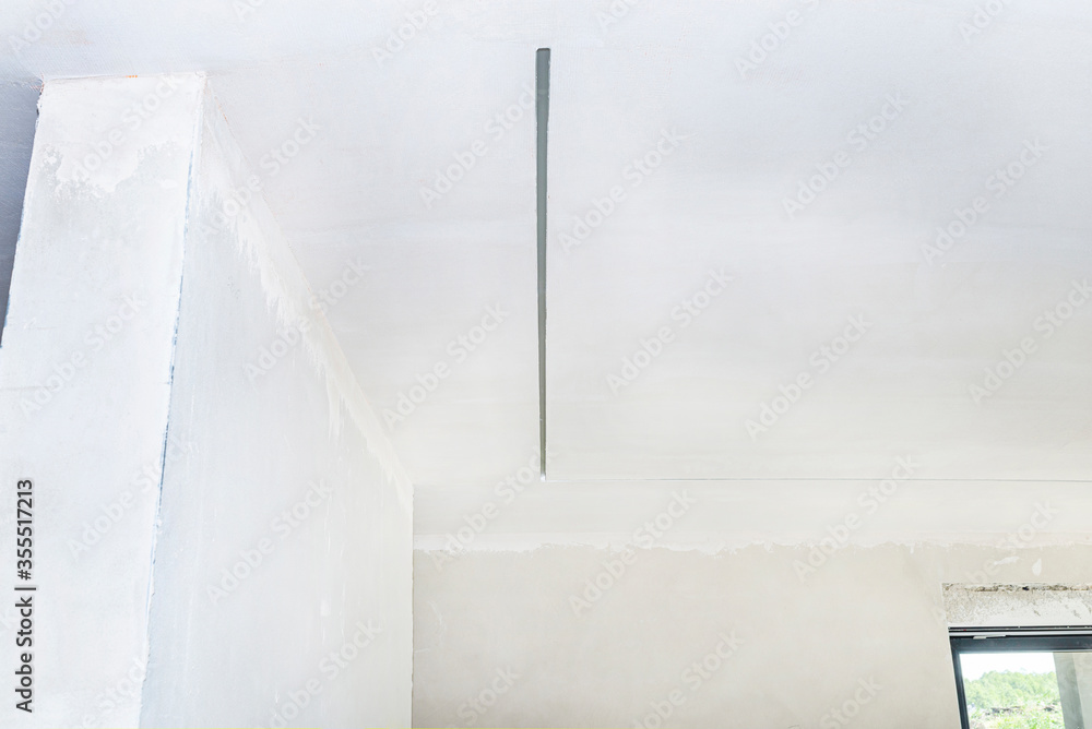 Aluminum profile for LED lighting placed in the ceiling in a newly built house.