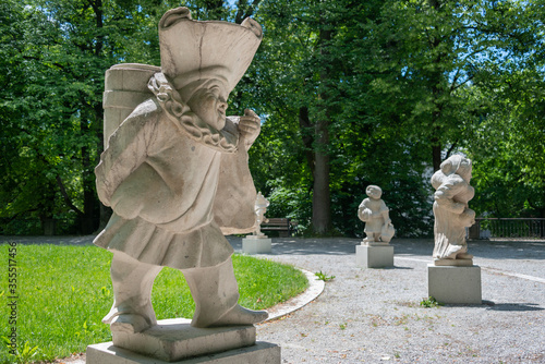 Dwarf statues in Dwarf Garden. Mirabellgarten or Mirabell garden is garden of Mirabell Palace in Salzburg. Austria photo