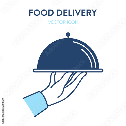 Metal platter icon. Vector concept illustration of a closed stainless steel plate of food in a waiters hand. Represents a concept of serving food, eating in a restaurant, haute cuisine