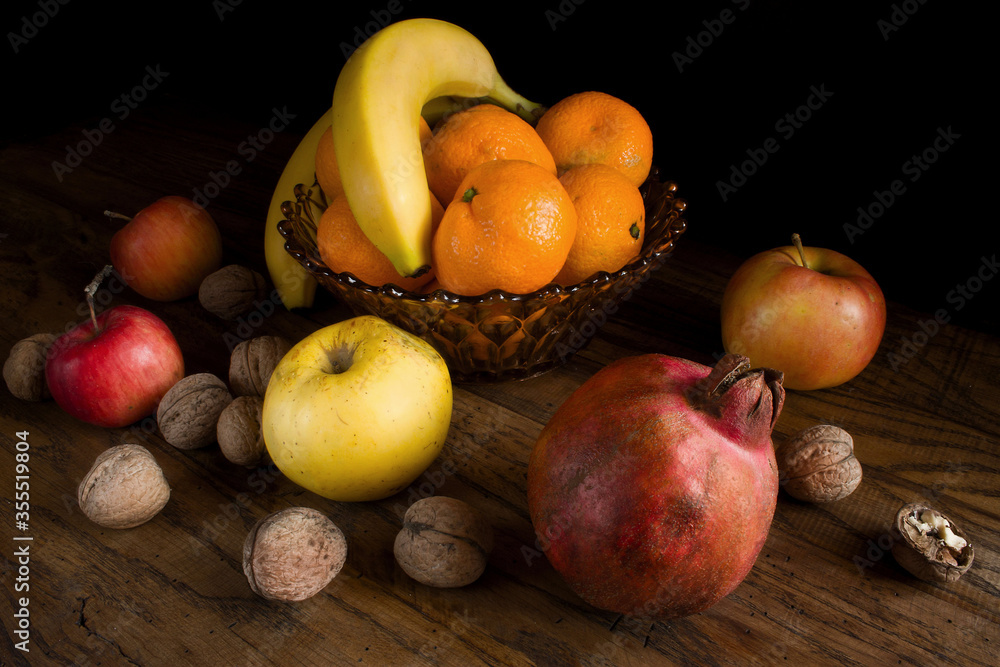 fresh fruits against a dark background fresh fruits against a dark background