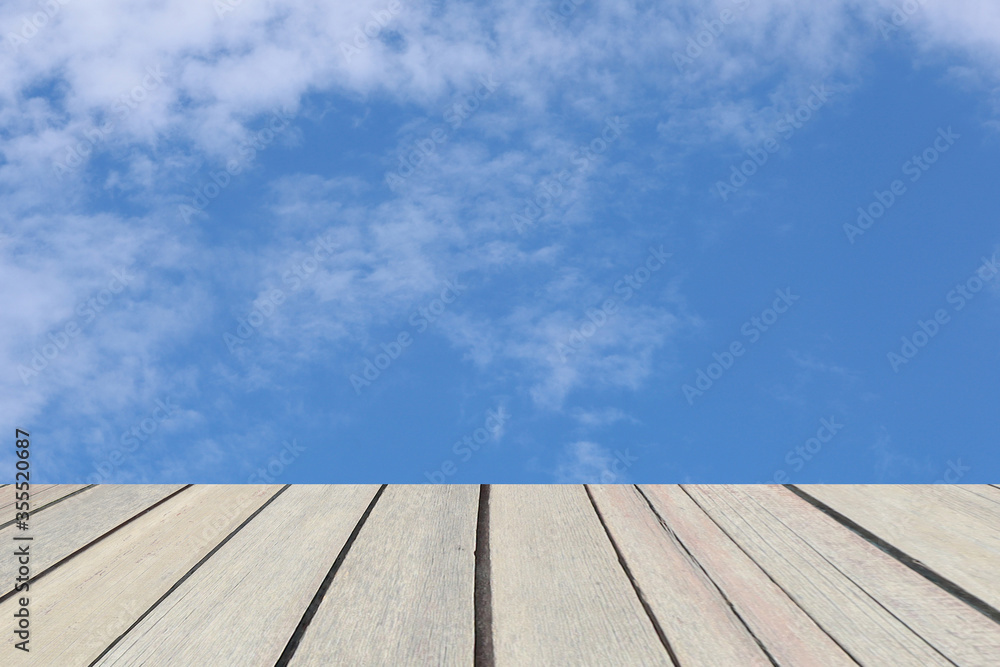 View of blue sky and cloudy on real wood board