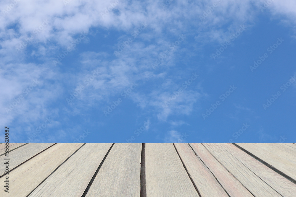 View of blue sky and cloudy on real wood board View of blue sky and cloudy on real wood board