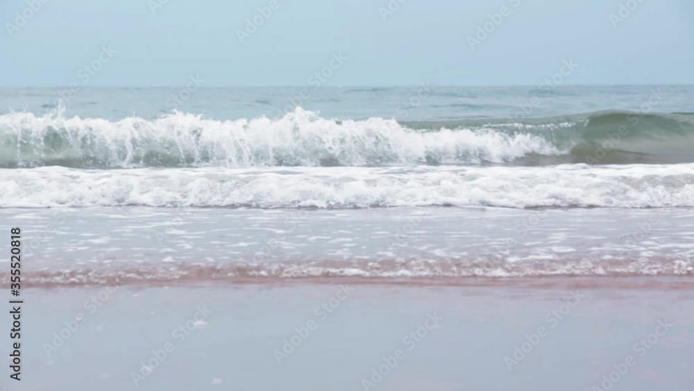 Beaches and ocean waves blowing sand White soft sponge sea in the south of Thailand Beaches and ocean waves blowing sand White soft sponge sea in the south of Thailand