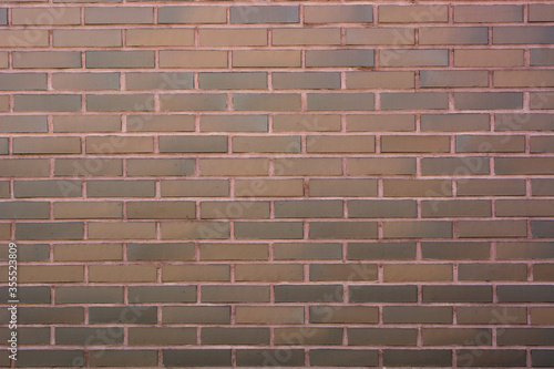 Texture of red brick wall closeup