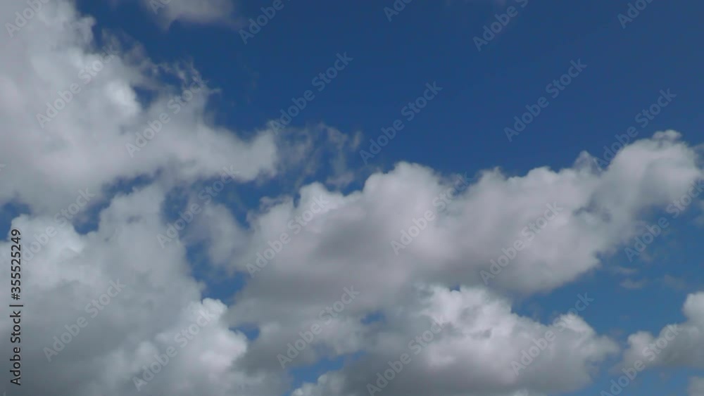 fluffy clouds background texture time-laps in 4k fluffy clouds background texture time-laps in 4k