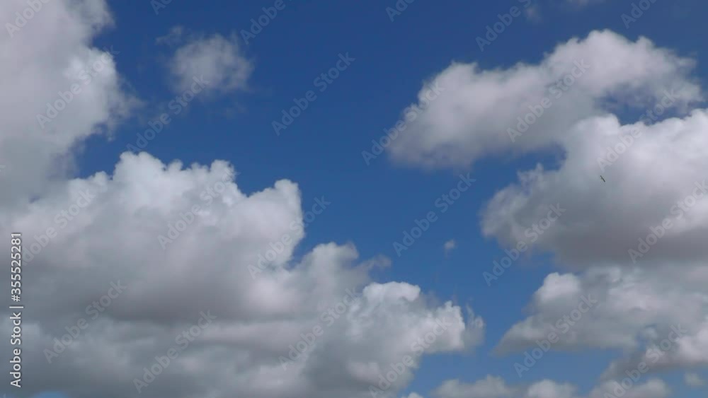 fluffy clouds background texture time-laps in 4k fluffy clouds background texture time-laps in 4k