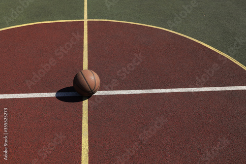  basketball ball on a green playground in the yard © victor198226