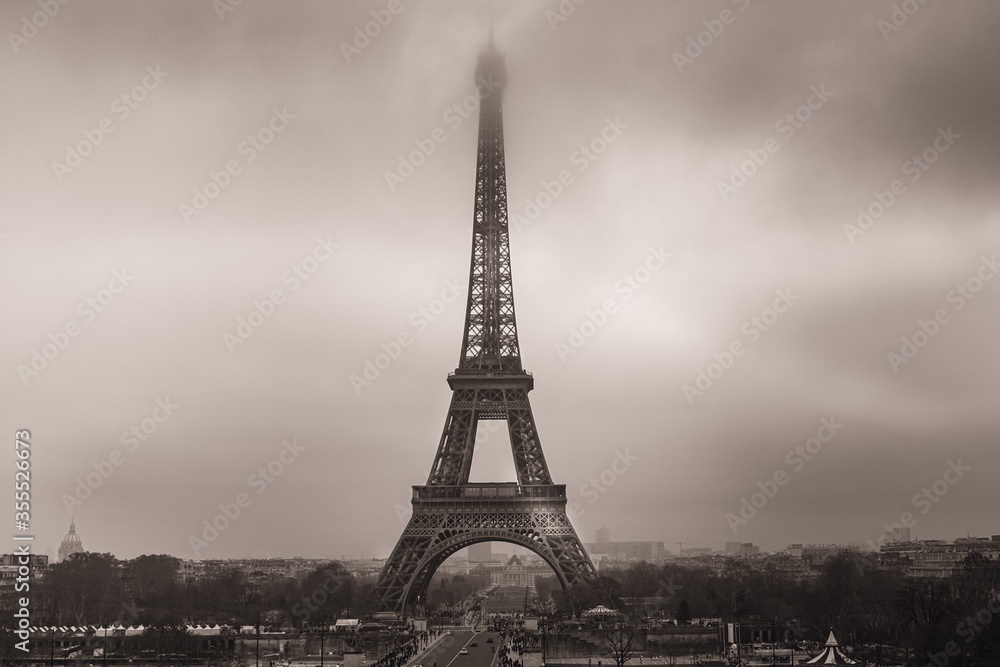 Eiffel tower paris in foggy day, winter, december