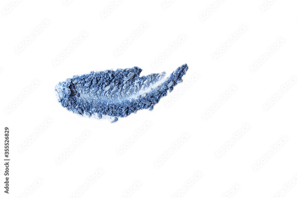 Shiny trendy eye shadow in blue on a white background. Beauty and eye makeup concept Shiny trendy eye shadow in blue on a white background. Beauty and eye makeup concept