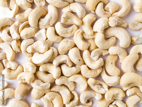 White raw cashew nuts in a white background stock image. 