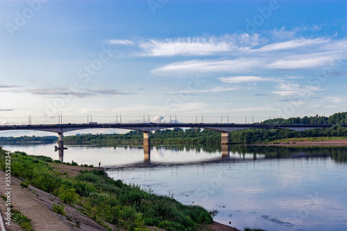 bridge over the river on a calm summer evening © Alx_Yago