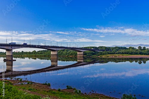 bridge over the river on a calm summer evening