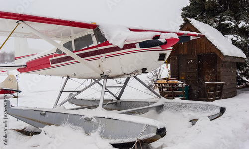 Float Plane Covered With Snow,Lake Spenard,Anchorage,Alaska,USA