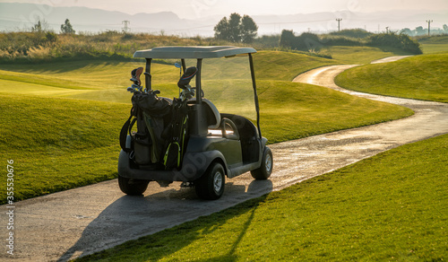 green golf course and electric vehicle