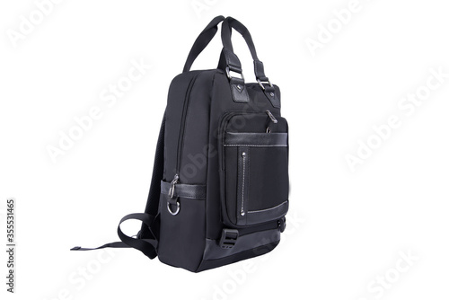Black backpack bag with handles on white background isolated