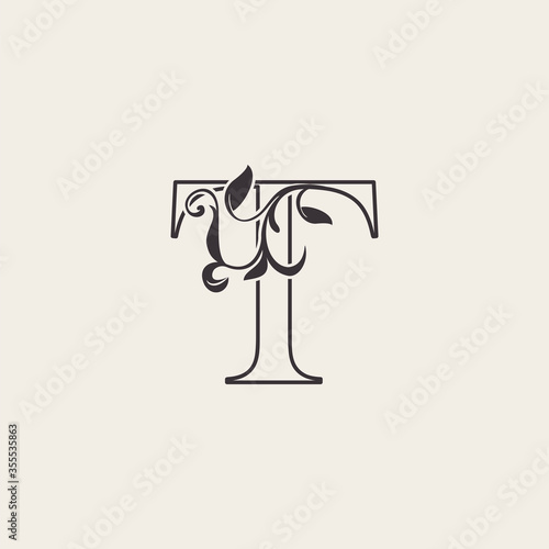 Graceful Floral Letter T Luxury Logo Icon . Black and White Outline simple beautiful logo. Vintage drawn alphabet in art nature leaf style.