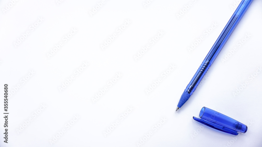 blue ballpoint pens on a white background photo blue ballpoint pens on a white background photo