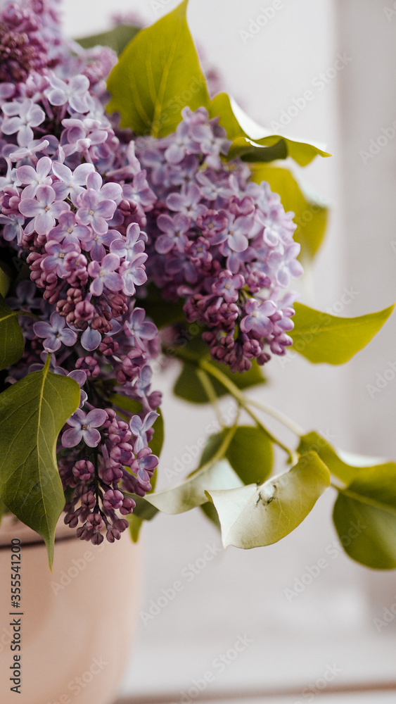 Bouquet of lilacs in a box.
