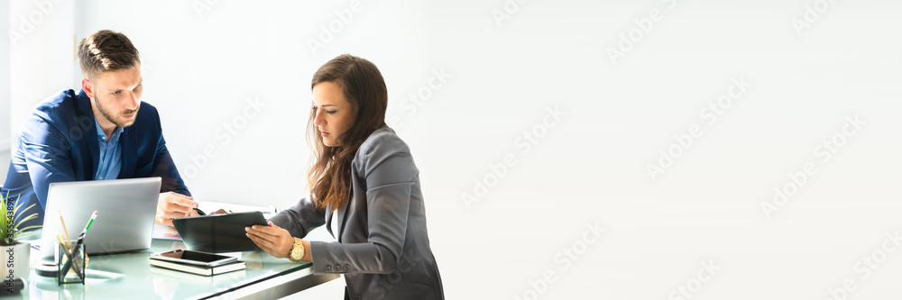 Two Businesspeople Using Digital Tablet Two Businesspeople Using Digital Tablet