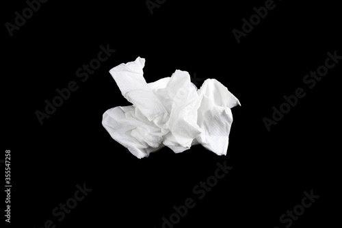 
Crumpled paper napkin isolated on black background