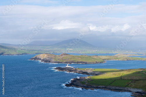 Beautiful view of Valentia Island Lighthouse at Cromwell Point. Locations worth visiting on the Wild Atlantic Way. Scenic Irish countyside on sunny summer day, County Kerry, Ireland.