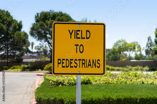 Yellow Yield To Pedestrians Sign © Felipe Sanchez