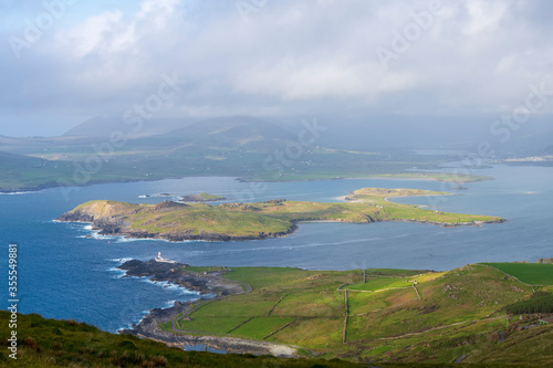 Fototapeta Naklejka Na Ścianę i Meble -  Beautiful aerial view of Beginish Island. Locations worth visiting on the Wild Atlantic Way. Scenic Irish countyside on sunny summer day, County Kerry, Ireland.