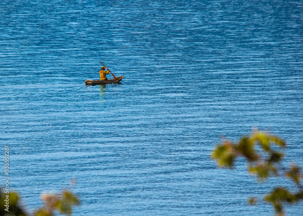 Fototapeta premium yellow kayak on the atitlan lake