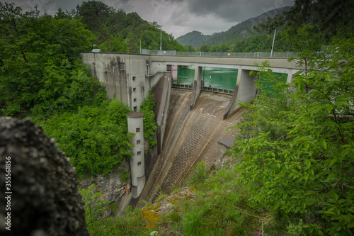 Small but steep dam for hydroelectric plant in Moste  Slovenia. View of the hidroelectric dam from above  looking down.