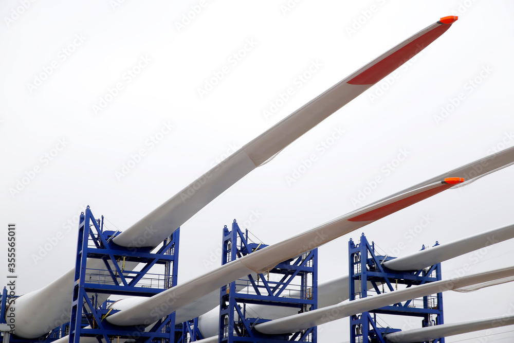 Newly constructed wings of wind-turbines ready to be transported to an offshore windpark, Holland Newly constructed wings of wind-turbines ready to be transported to an offshore windpark, Holland