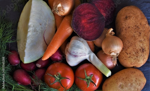 fresh ripe vegetables on a black background close-up 