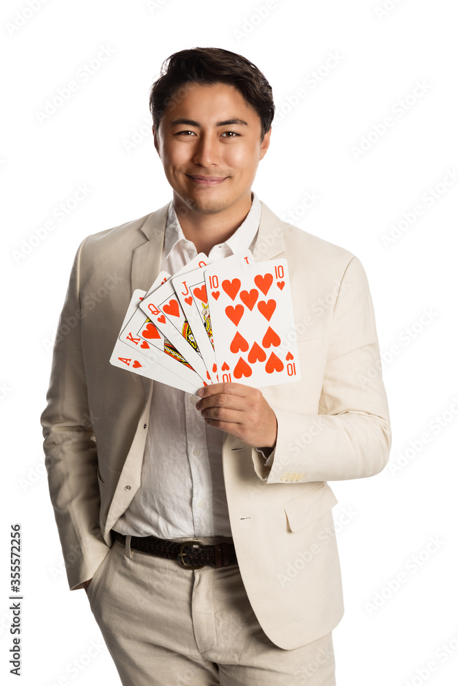 Image of a handsome Japanese male holding
huge playing cards wearing a beige coat and collared shirt. Image of a handsome Japanese male holding
huge playing cards wearing a beige coat and collared shirt.