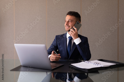 Business man doing a phone call