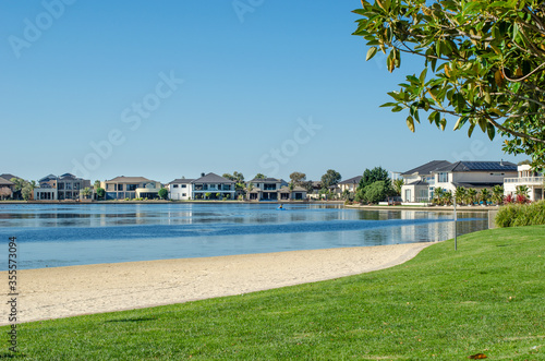 View of Sanctuary Lakes with some luxury waterfront houses in the distance.  © Doublelee