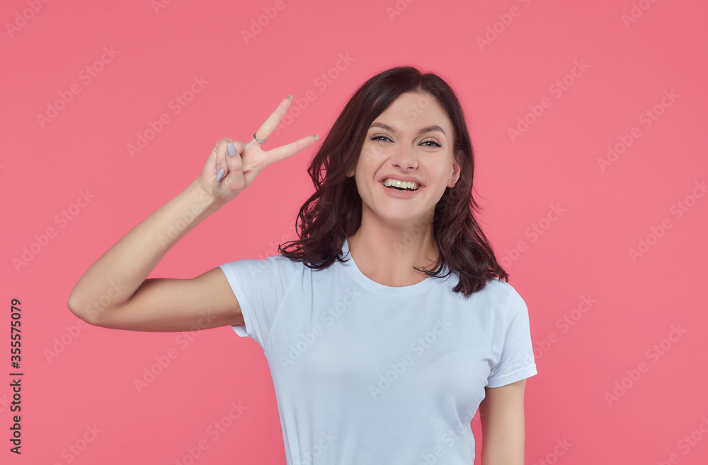 Fototapeta premium beautiful girl shows various emotions. Talented portrays the inner state and mood. The concept of advertising with free space for text