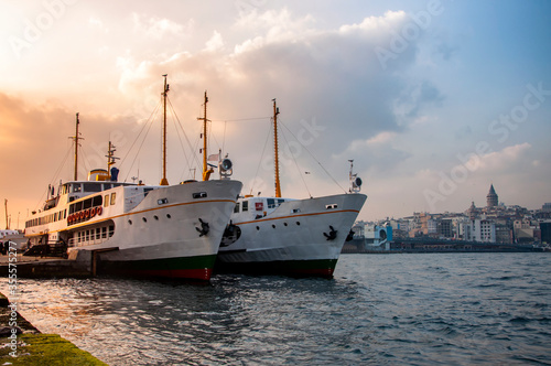 Sunset and classic passenger ferries in Istanbul © erdincaltun