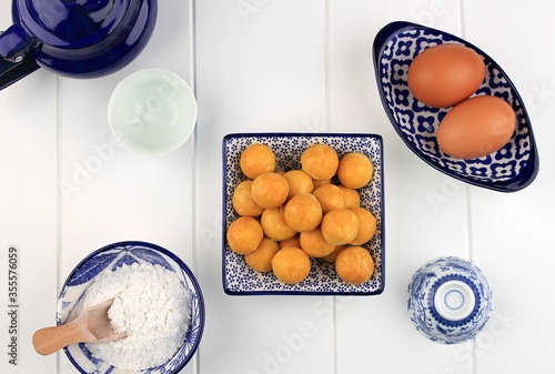 Top View Kue Nastar or Indonesian Pineapple Tart Cookies Stuffed with  Pineapple Jam. Made from Flour, Egg, Butter, and Sugar. Popular for Hari Raya Lebaran and Christmas. Selective focus photo