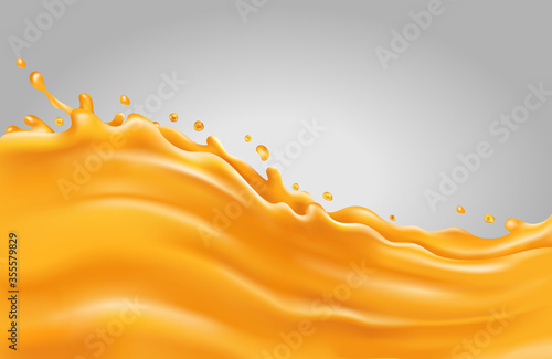 Orange juice splash wave on a gray background