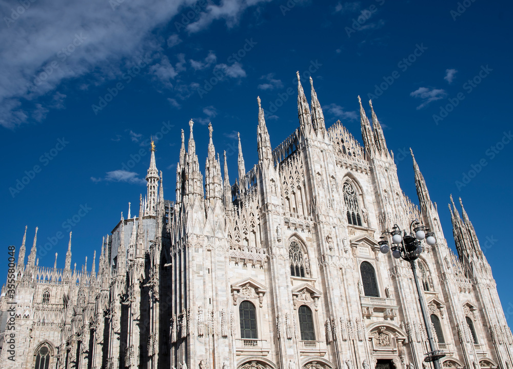 Milan Cathedral with its golden Madonnina.