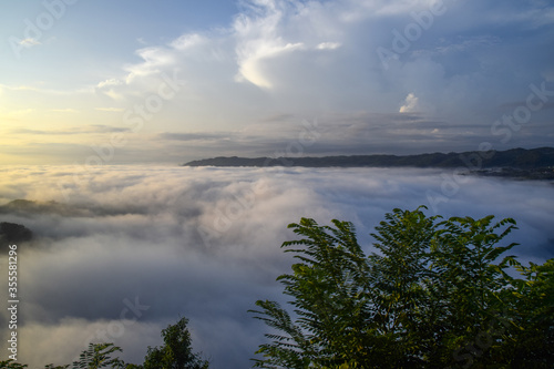 Sea of clouds over hills in Mangunan, Yogyakarta, Indonesia.