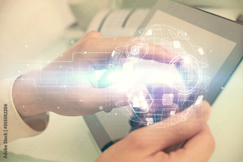 Double exposure of man's hands holding and using a phone and social network theme drawing. Double exposure of man's hands holding and using a phone and social network theme drawing.