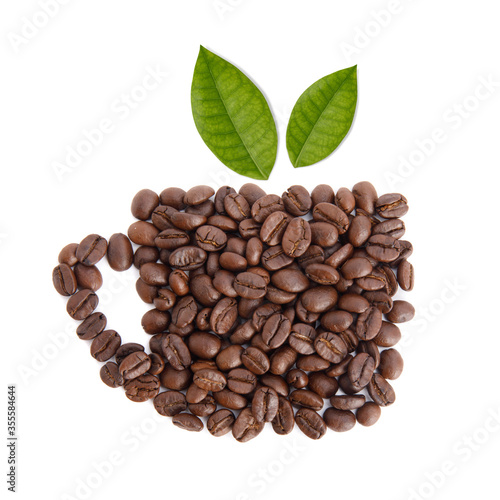 Roasted coffee beans with coffee leaves in the shape of a cup studio shot isolated on white background, Healthy products by organic natural ingredients concept