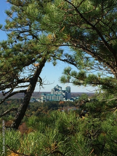 View from the Lantern Hill hiking trail with Foxwoods Resort Casino in Mashantucket, Connecticut seen through the trees
