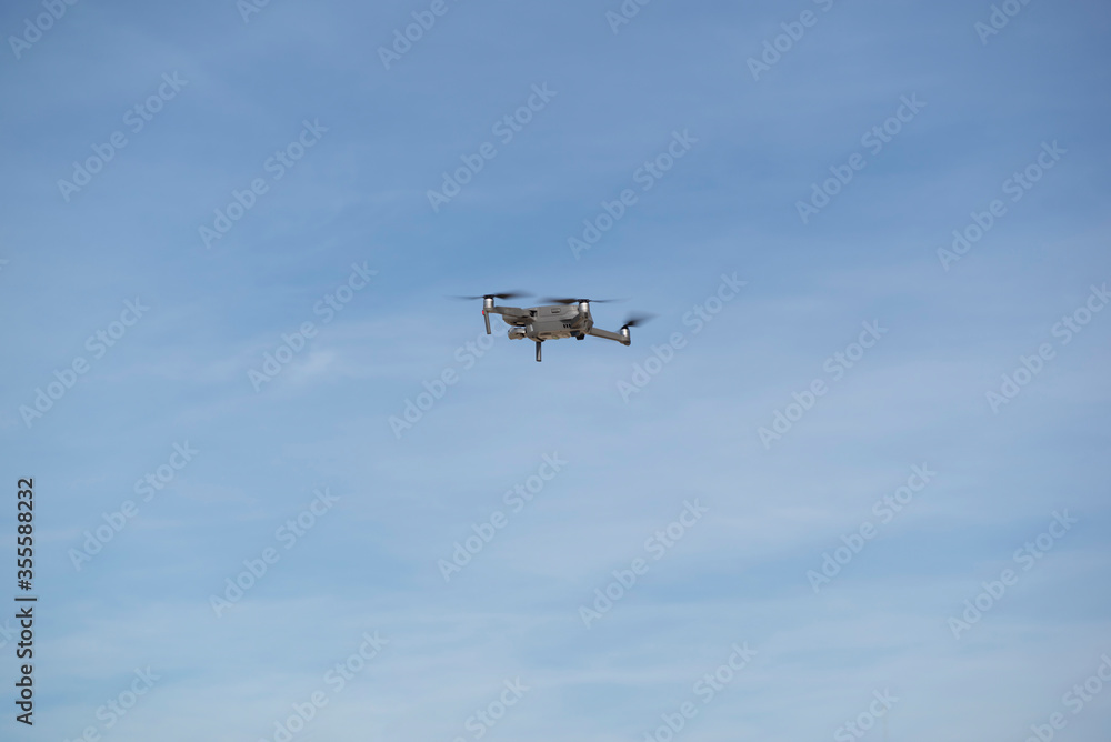Drone flying over landscape with digital camera Drone flying over landscape with digital camera