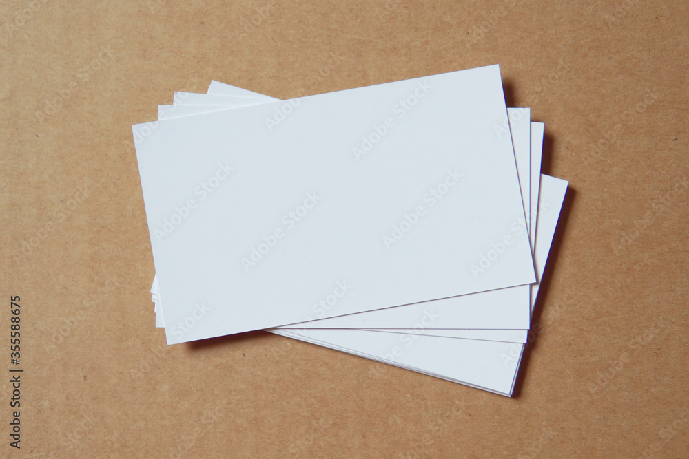 Business card on colored background. Blank name card for company logo, Branding Mock-up. Flat lay. Copy space for text Business card on colored background. Blank name card for company logo, Branding Mock-up. Flat lay. Copy space for text