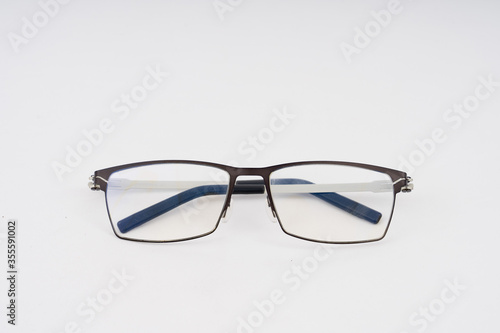 elegant design eyeglasses on white background.selective focus