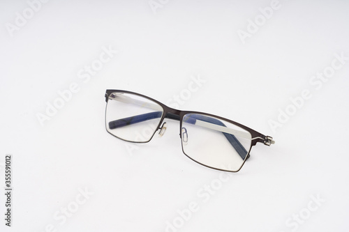 elegant design eyeglasses on white background.selective focus