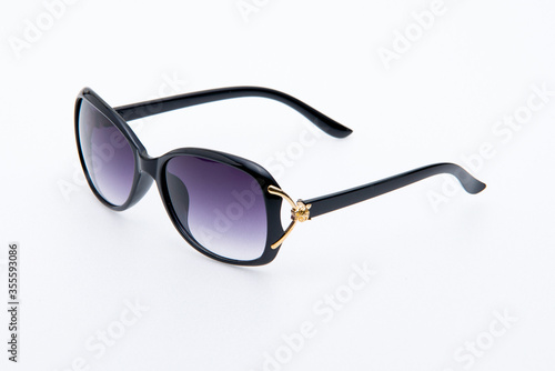 Fashion sunglasses black frames on white background.